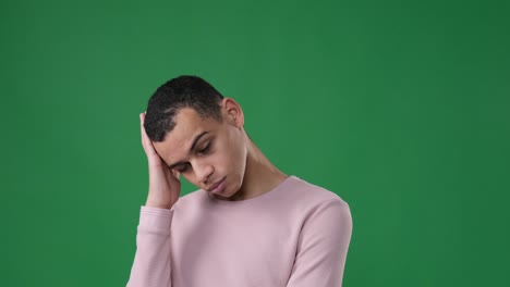 stressed man over green background