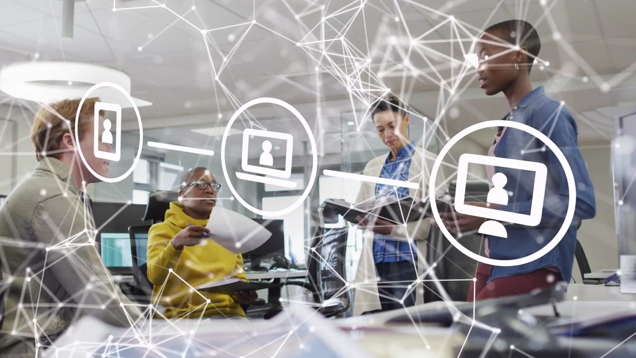 Team reviewing project docs, yellow-hoodie pointing tablet and passing sheet, network mapping faces