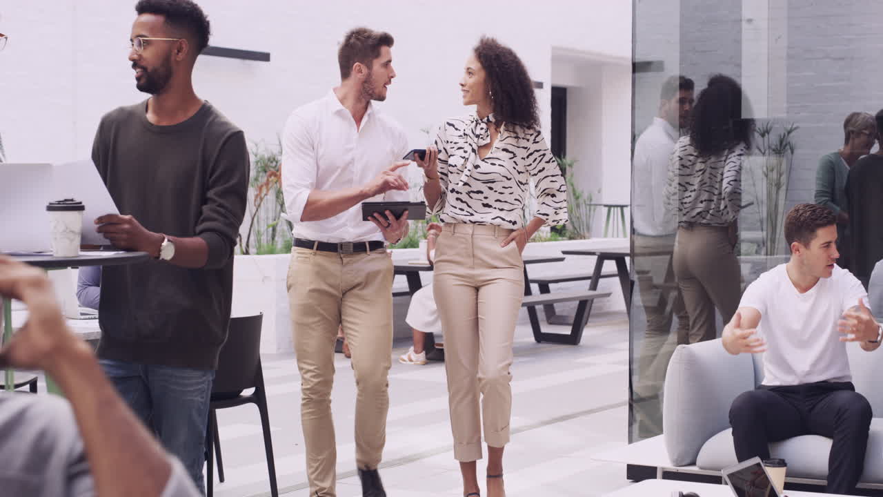 colleagues using a digital tablet