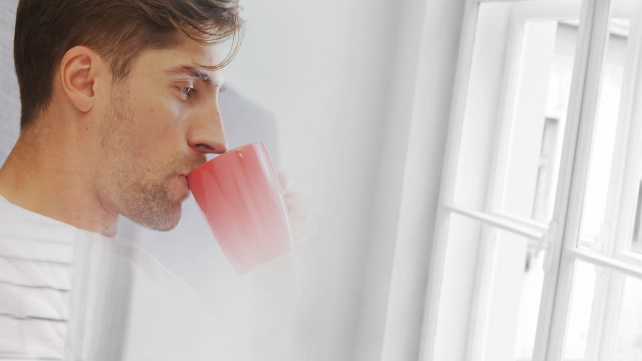 Animazione di uomo caucasico che beve caffè alla finestra