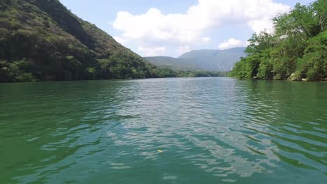 boat sailing in the grijalva river, chiapas mexico