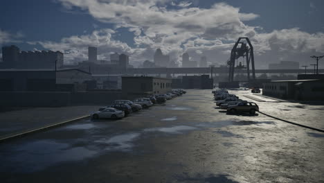 industrial area with cars in parking lot