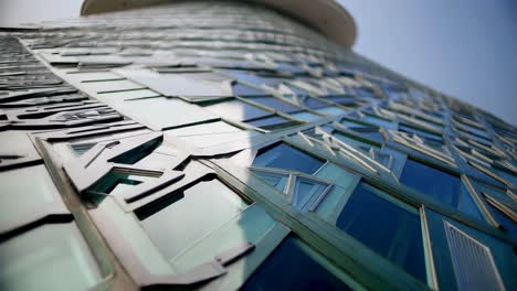 abstract view of a modern skyscraper's glass facade