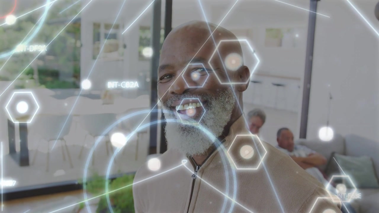 Senior man turning head, hexagon nodes and lines shifting aside, revealing smile, showing home tech