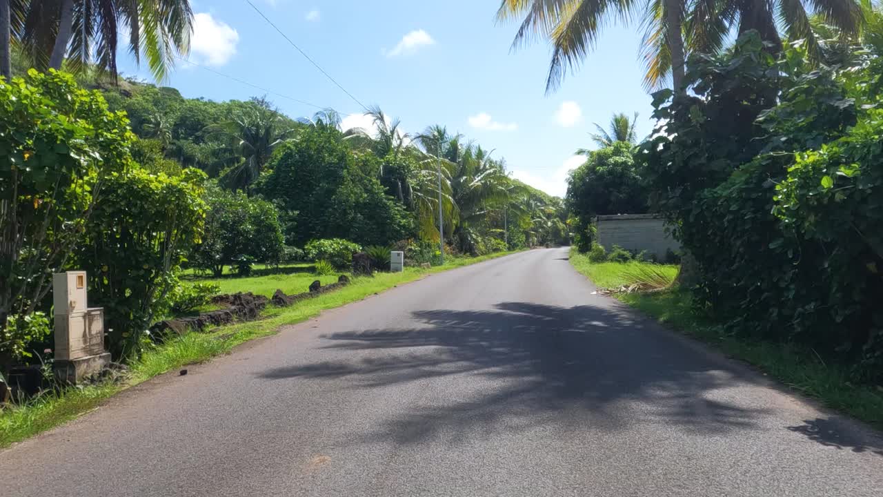 Driving on Coastal Road and Village on Bora Bora Island, French Polynesia