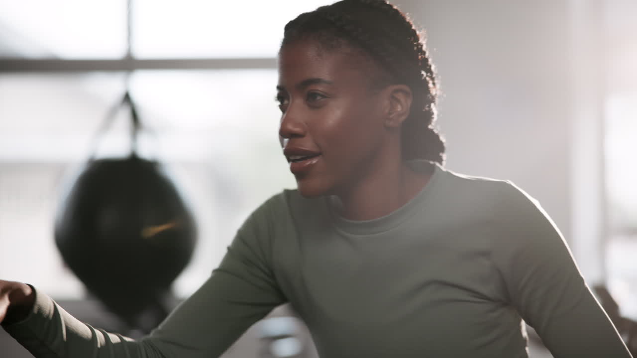Woman working out on indoor cycle