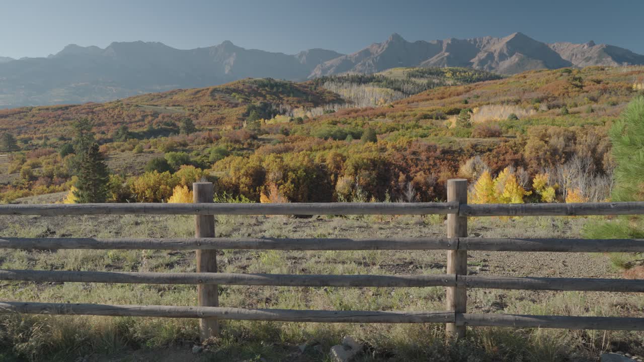 Scenic Mountain Landscape with Wooden Fence