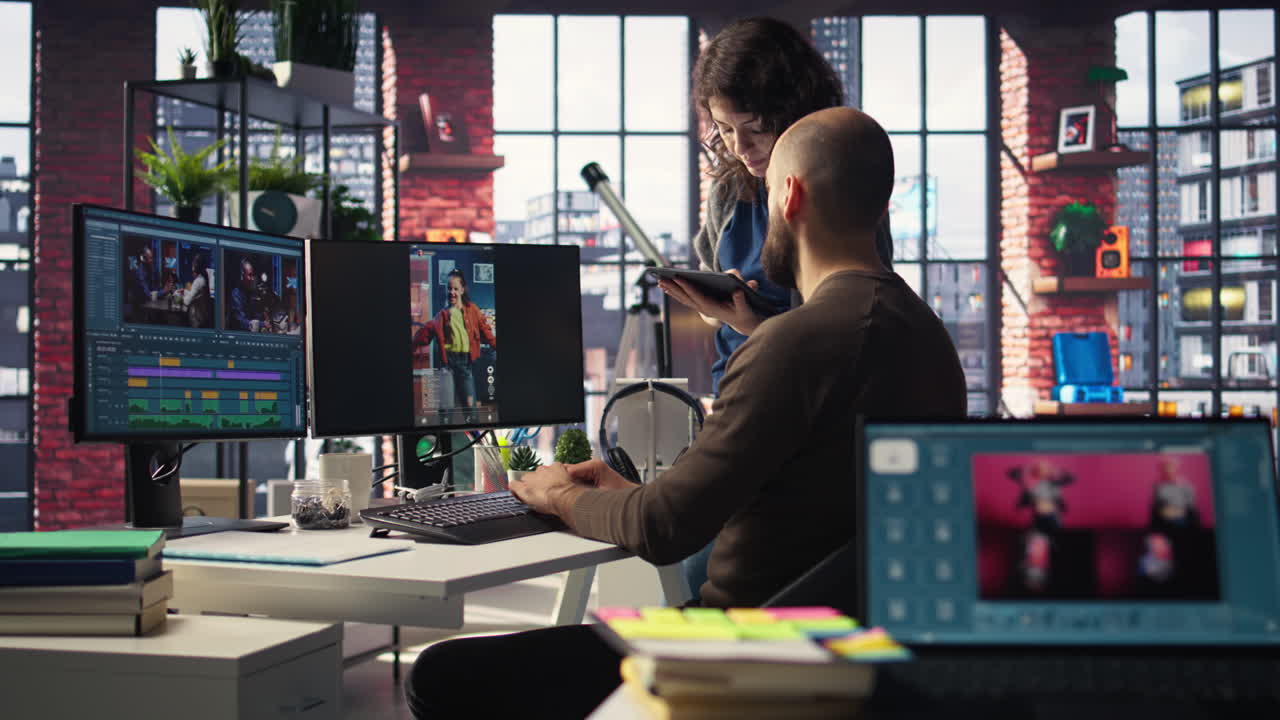 Man and woman collaborate on content creation for the media industry