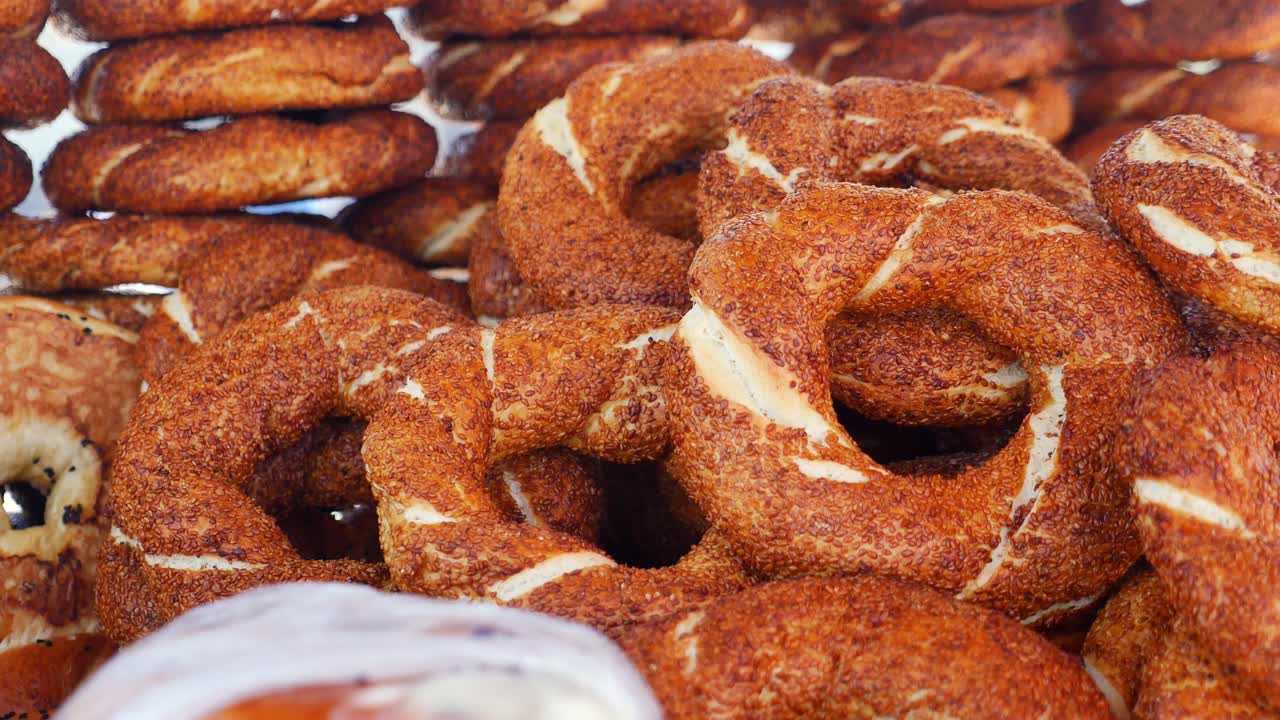 Pile of traditional Turkish simit bagels with sesame seeds