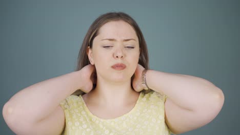 young woman with neck pain.