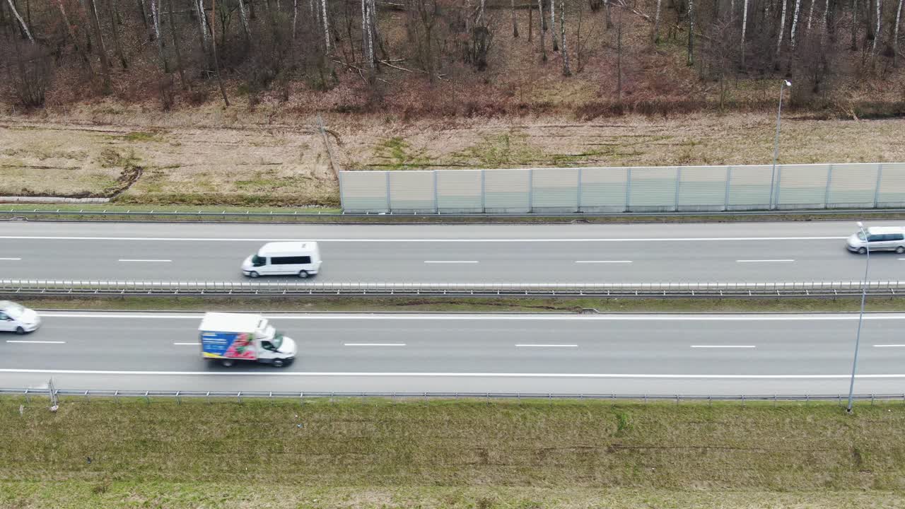 Modern Transportation of A4 Highway Bordered by Sound Barrier and Forest in Poland