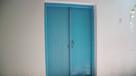 tilt shot of front door of traditional old house located at kalamata, greece