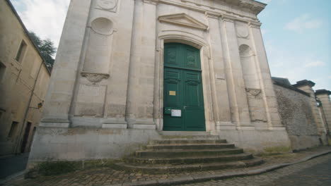 ukrainian catholic church in france wide angle of the entry with signs mention on the front door