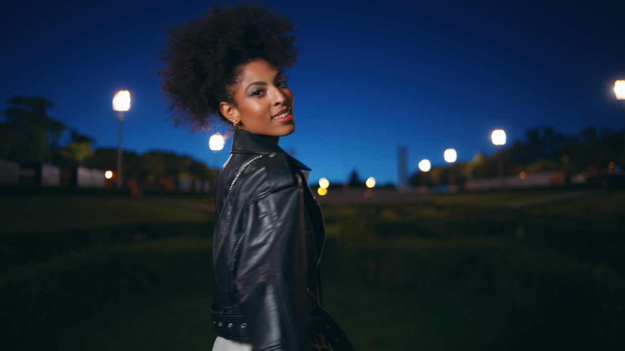 Romantic girl enjoying night walk looking dark sky closeup. Happy woman