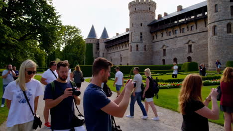 tourists exploring a beautiful medieval castle