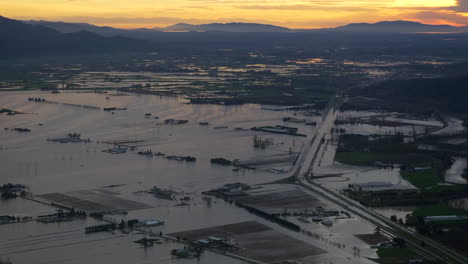 flooded infrastructure and roads west canada state of emergency aerial