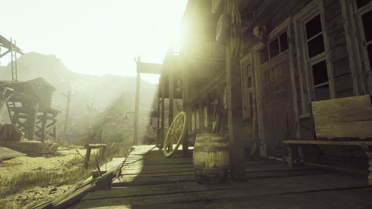 Abandoned western town with vintage structures illuminated by sunlight