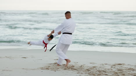 Beach,-karate-and-a-father-swinging-his-daughter