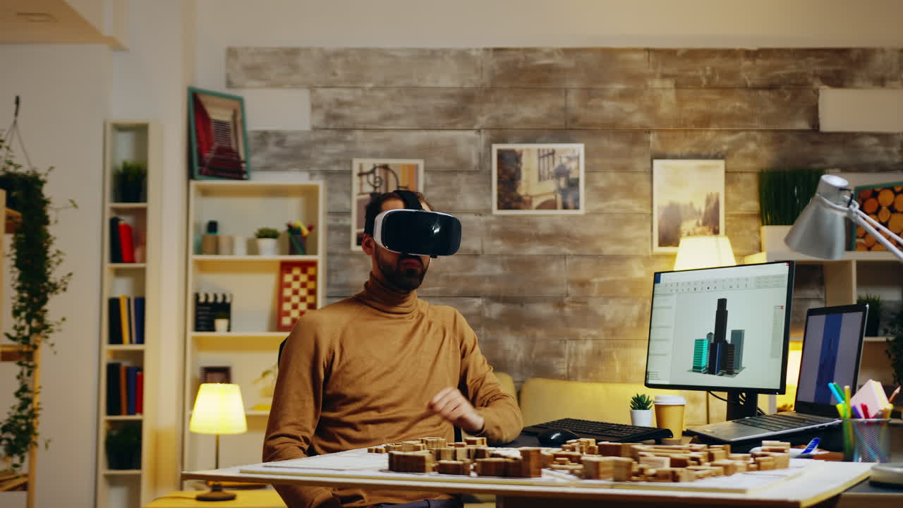 Young architect using virtual reality goggles