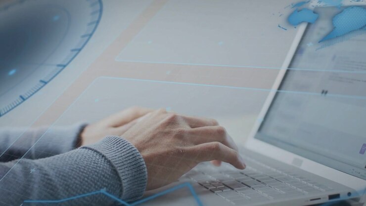 Adult male hands typing on laptop first key press initiating dial map chart overlays updating tech
