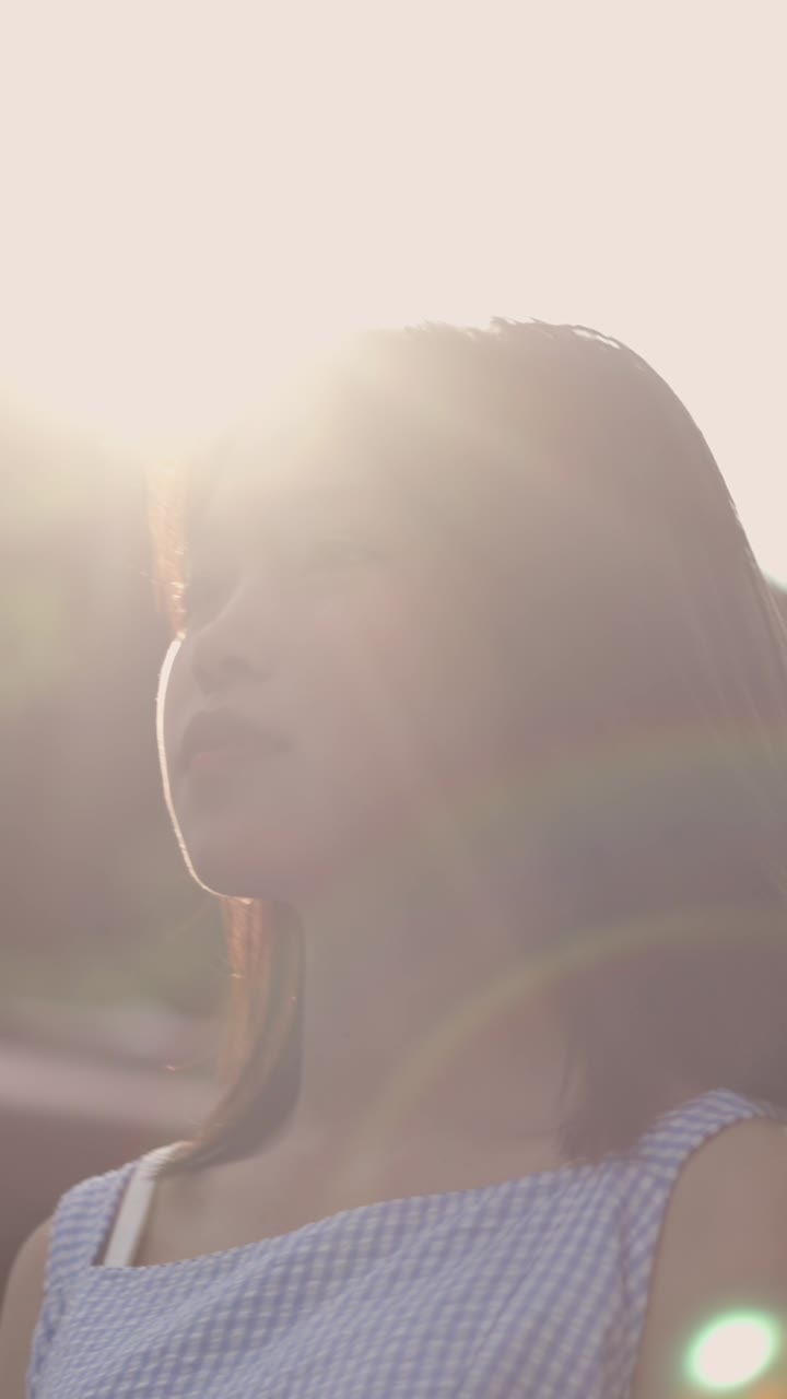 Portrait of a woman in sunlight