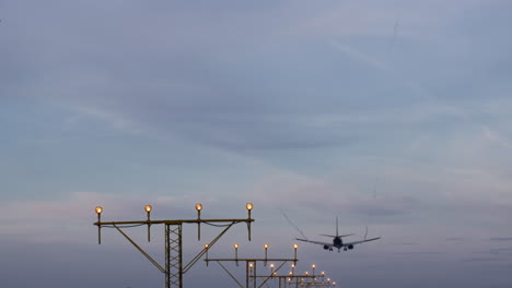 airplane landing at dusk