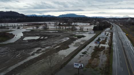 flooded plains near highway road in canada, british columbia