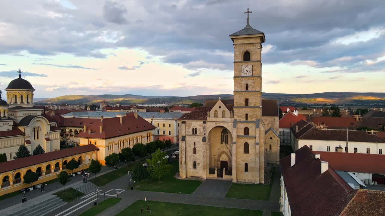 Aerial drone view of Alba Carolina Citadel in Alba-Iulia, Romania. Cityscape, multiple buildings, church, people