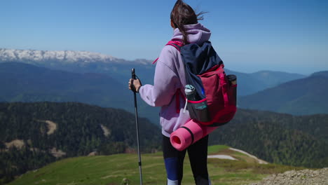 hiker enjoying the mountain view