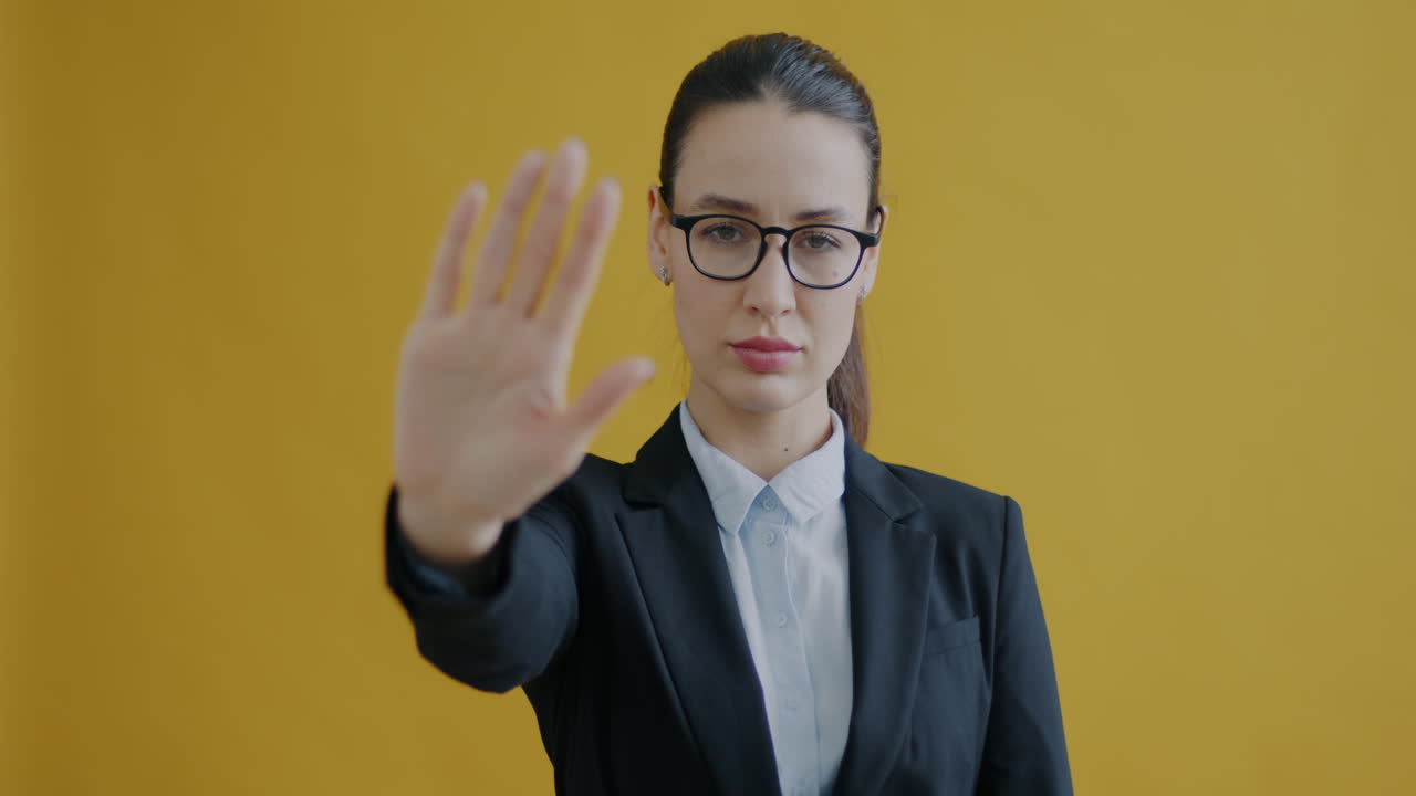 Woman in business suit rejecting