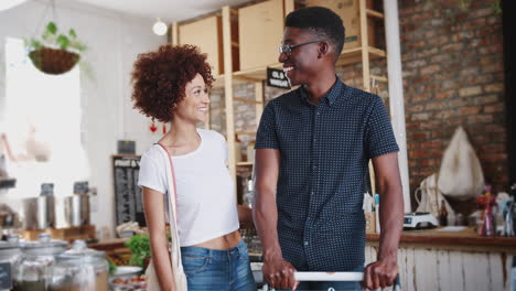 Portrait-Of-Couple-Shopping-In-Sustainable-Plastic-Free-Grocery-Store