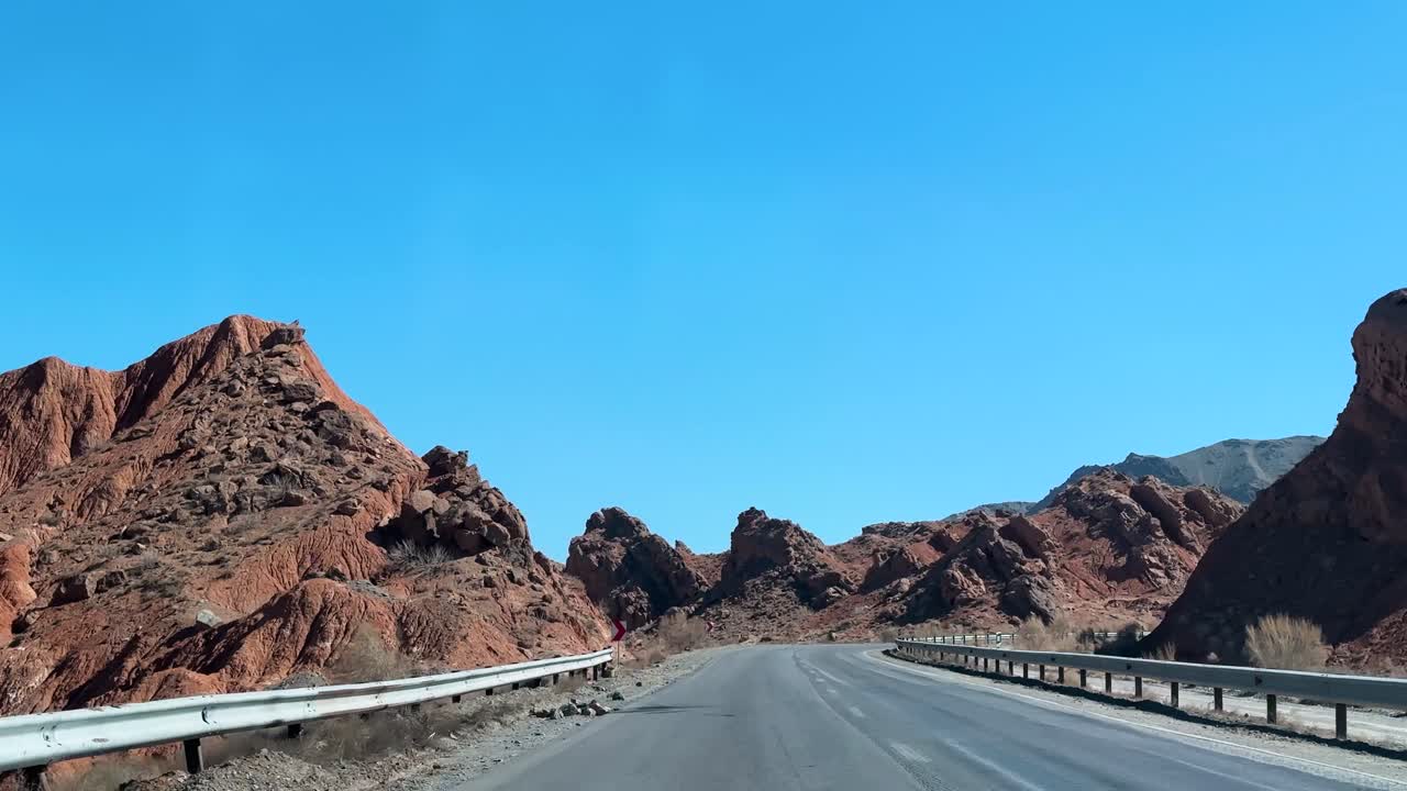 driving in wild nature of Saudi Arabia road trip travel in desert luxury landscape nature mountain scenic and sand dune in horizon destination summer outdoors middle east Asia wanderlust holiday
