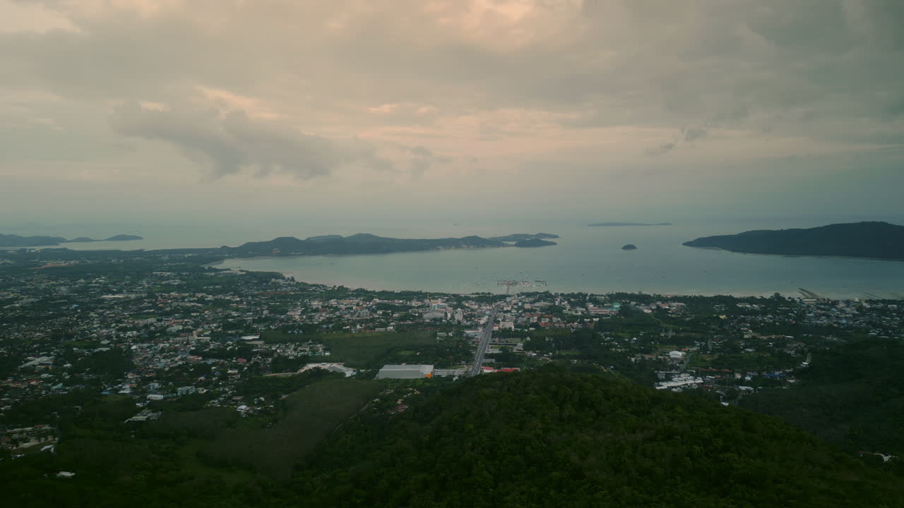 Aerial View of Coastal Town with Islands and Mountains