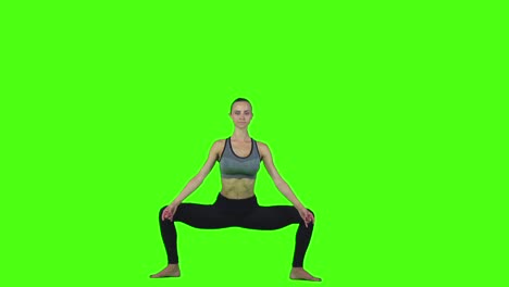 mujer en una postura de yoga sentada