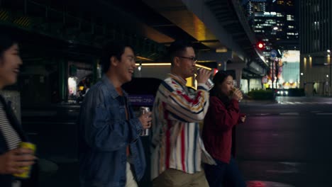 friends enjoying a night out in a city