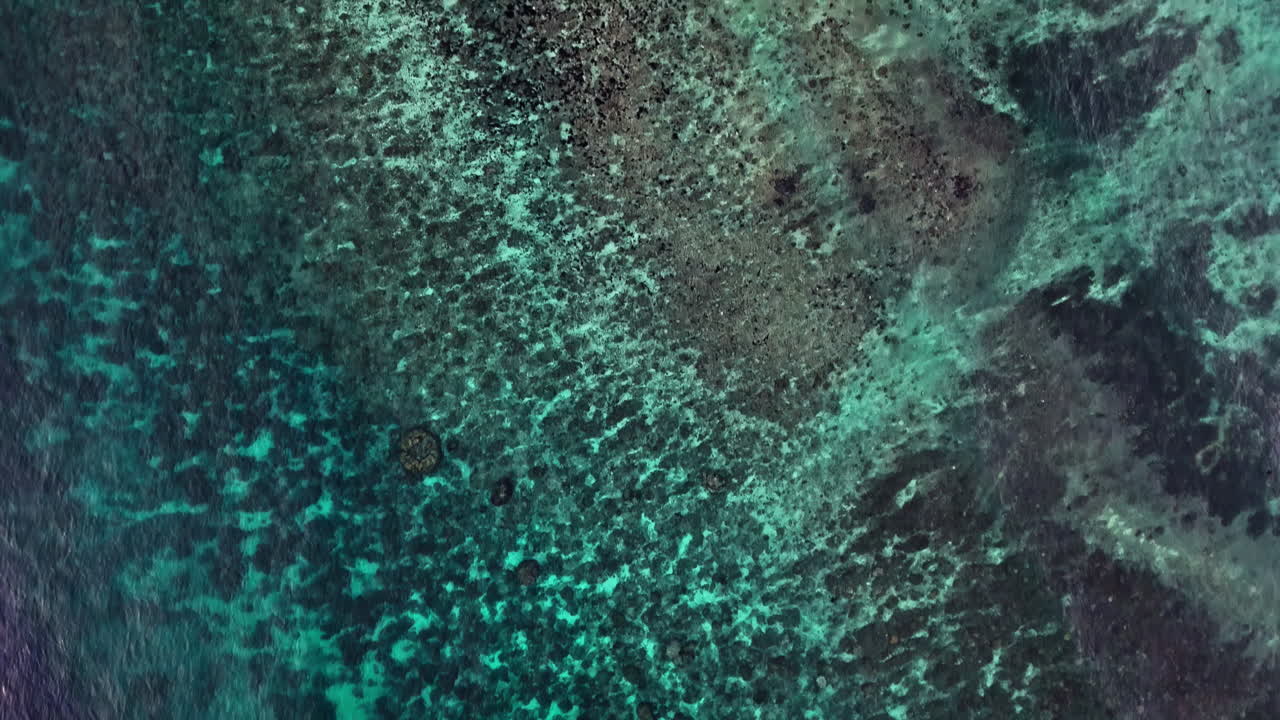 Exotic shallow ocean coastine in Indonesia, aerial top down view