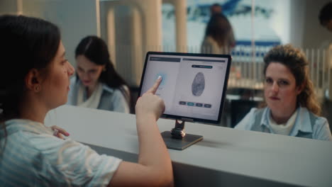 fingerprint scanning at a reception desk