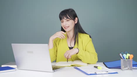 woman making video call on laptop.