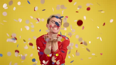 man celebrating with confetti