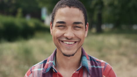 Slow-Motion-Portrait-of-happy-mixed-race-man-laughing