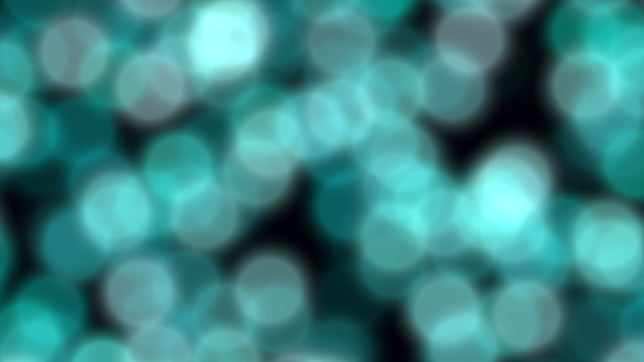 A vivid composition of purple and blue circles on a black backdrop. The circles are variably sized and distributed, creating a vibrant and abstract visual contrast