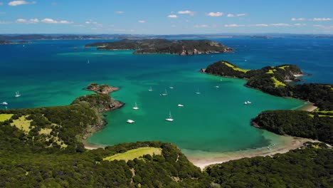 Otiao-Bay-with-anchored-boats,-beautiful-sunny-day-aerial