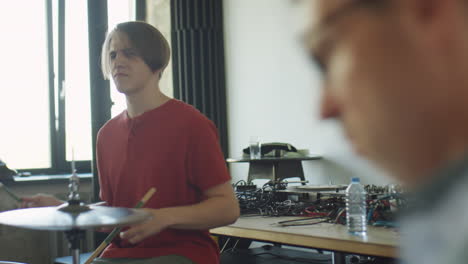 musicians playing instruments in a studio