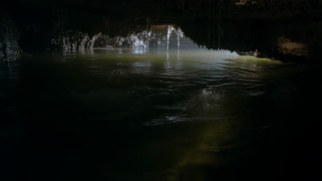 mysterious underground cave with dripping water