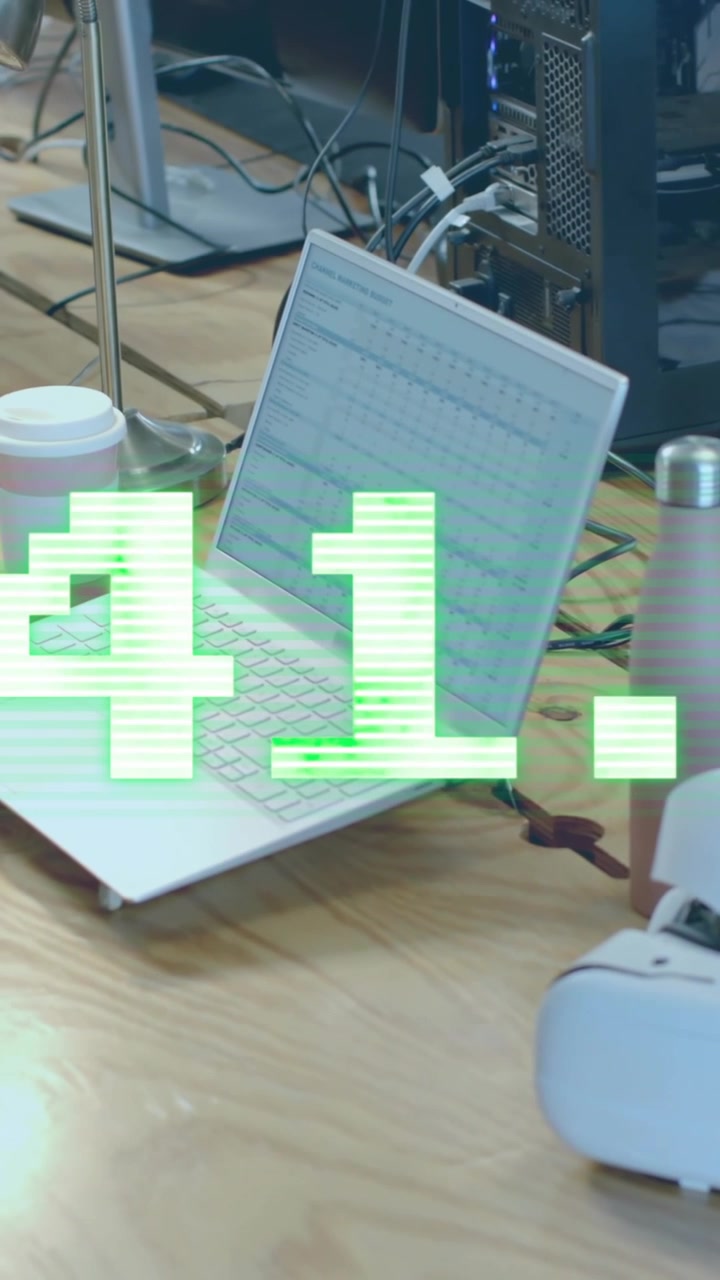 Animation of financial data processing over computer on office desk