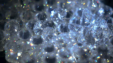 macro shot over stack of glimmering diamonds