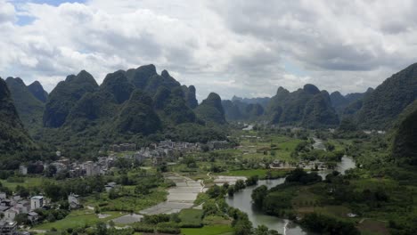 aerial: chinese karst mountain landscape, asian rural countryside