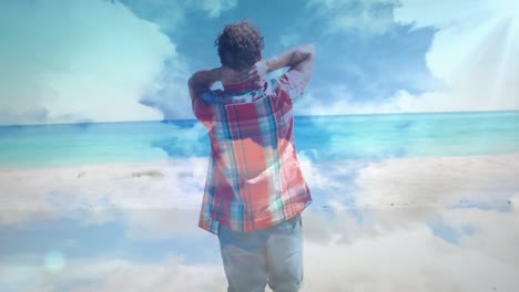 animación del cielo con nubes sobre un hombre biracial con los brazos extendidos