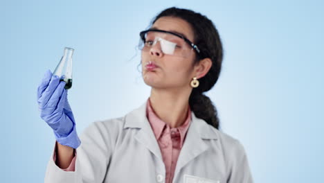 women, scientist and glass beaker for analysis