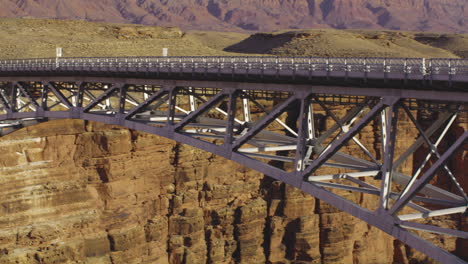 panoramic shot of expansive navajo bridge structure over marble canyon, arizona